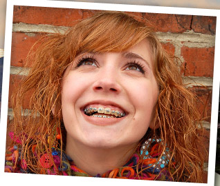 girl smiling and wearing braces